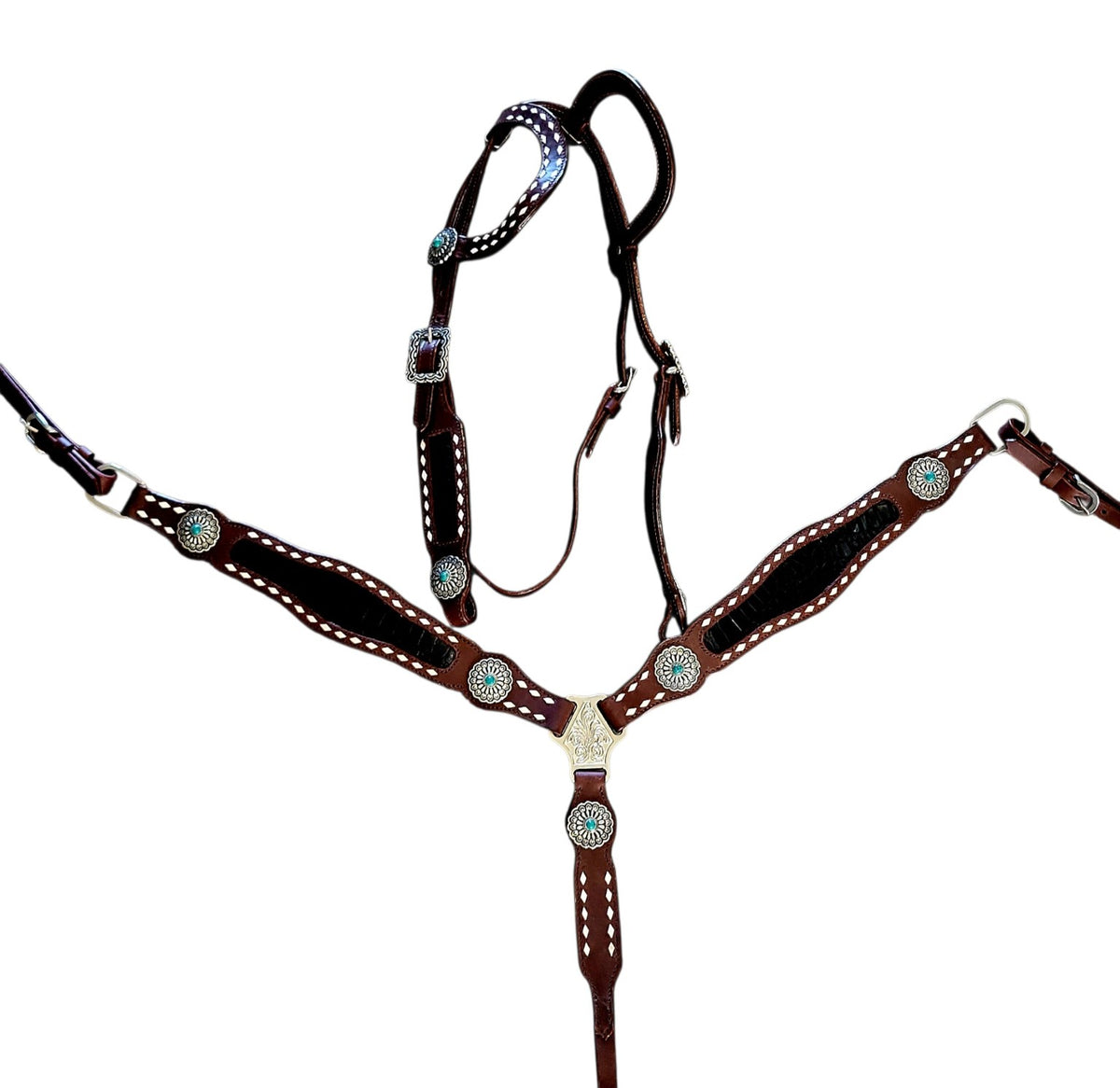 Brown leather tack set with black cross inlay white buckstitch and turquoise conchos